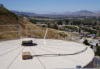 A water storage tank serving the Edna Road System in California, overlooking surrounding communities supplied by Golden State Water Company.
