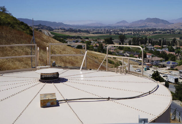 A water storage tank serving the Edna Road System in California, overlooking surrounding communities supplied by Golden State Water Company.