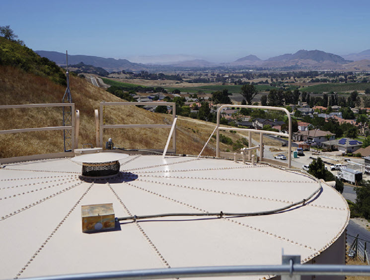 A water storage tank serving the Edna Road System in California, overlooking surrounding communities supplied by Golden State Water Company.