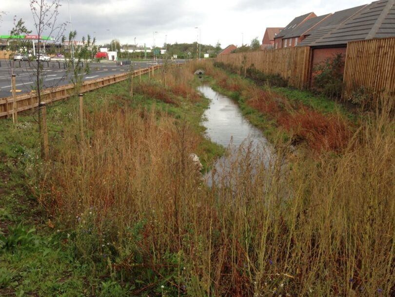 Integrated green and grey sustainable drainage system in a UK urban development