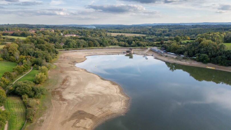 Aerial view of Ardingly Reservoir in Sussex showing low water levels during October 2025.